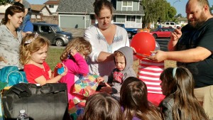 Opening Presents With Lots of Helping Hands