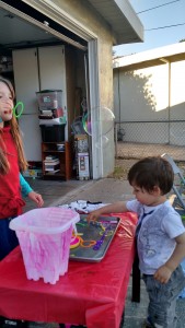 Ama and Finn blowing bubbles