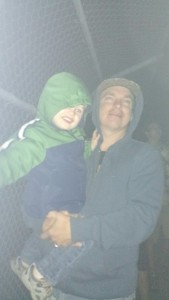 Daddy and Azri watching fireworks from the catwalk in Petaluma