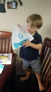 Painting.  Azri made an "O"